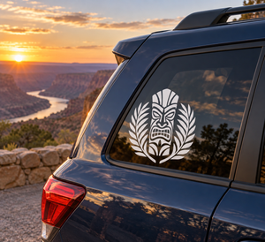 Tiki palm mask vinyl decal on car rear window, white face design