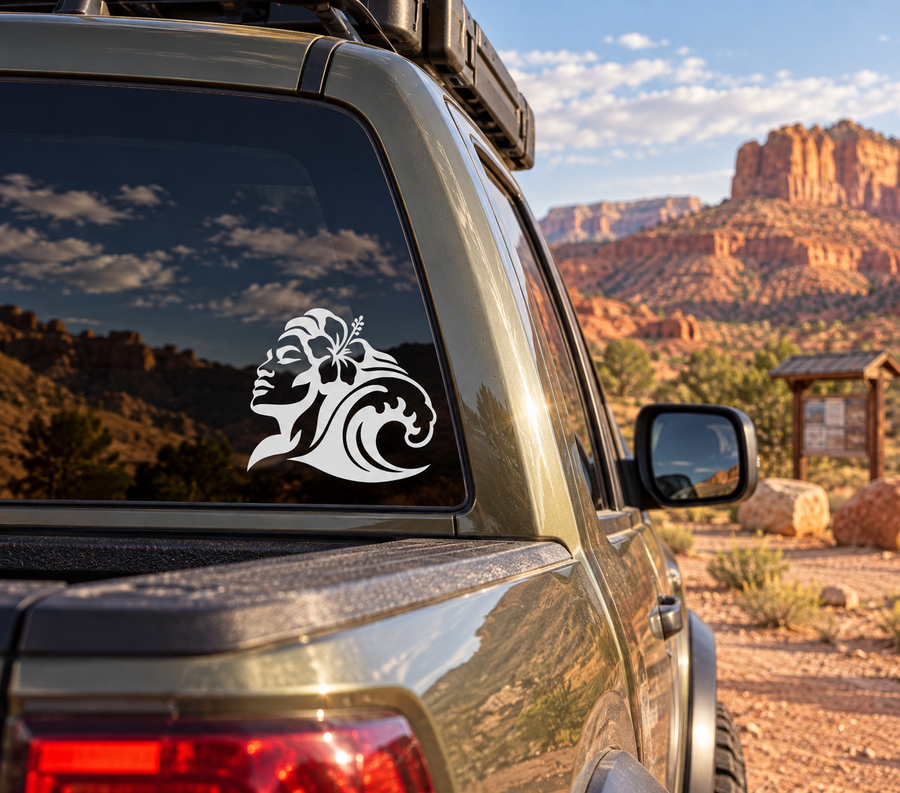Vinyl car decal with white tiki woman profile, hibiscus flower, and wave design