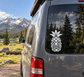 Pineapple smile tiki vinyl decal on vehicle window