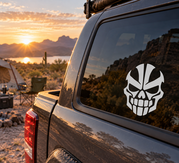 Skull face vinyl decal for vehicle window, black-and-white graphic