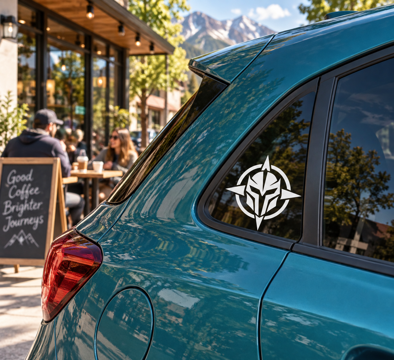 Tiki compass vinyl decal on blue car window, black-and-white emblem
