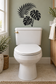 Black palm leaf toilet vinyl decal on white toilet