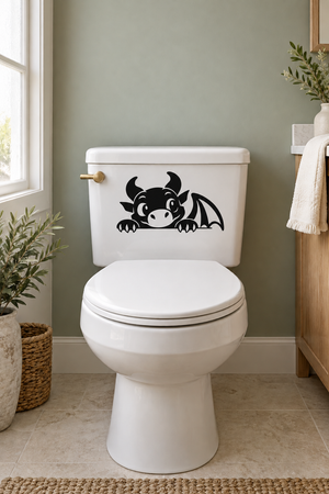 Vinyl dragon guardian decal on white toilet tank, black cartoon dragon graphic