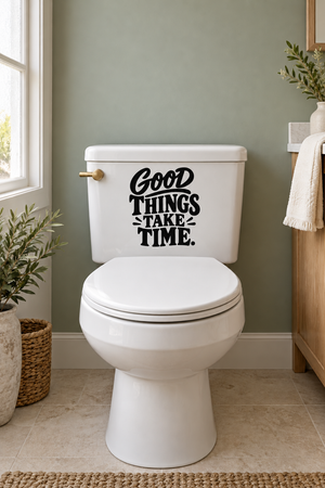 Toilet with black "Good Things Take Time" vinyl decal on tank lid