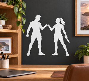 White vinyl decal silhouette of two track athletes fist bump