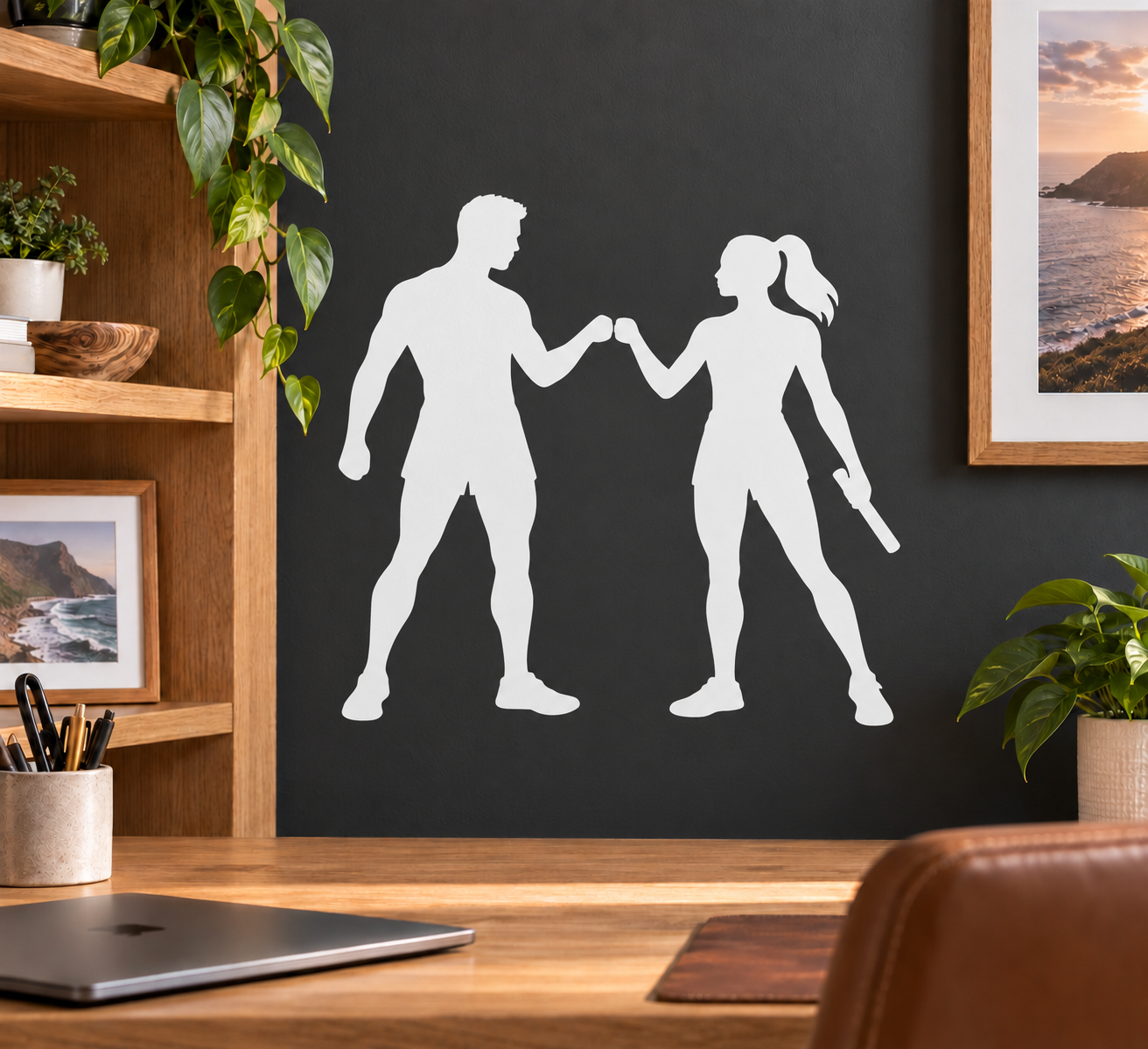 White vinyl decal silhouette of two track athletes fist bump
