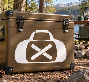 Track gear bag vinyl decal on dark suitcase-style bag, white hat and crossed tools logo
