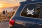 Track and field vinyl decal on car window: white moon and crossed baton icon.