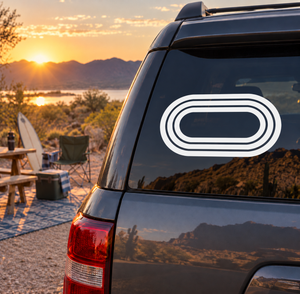 Track oval vinyl decal on car rear window, white concentric oval lines