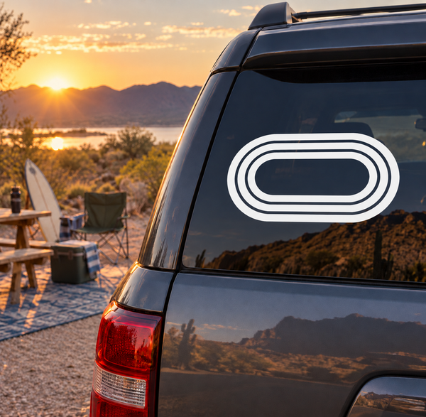Track oval vinyl decal on car rear window, white concentric oval lines