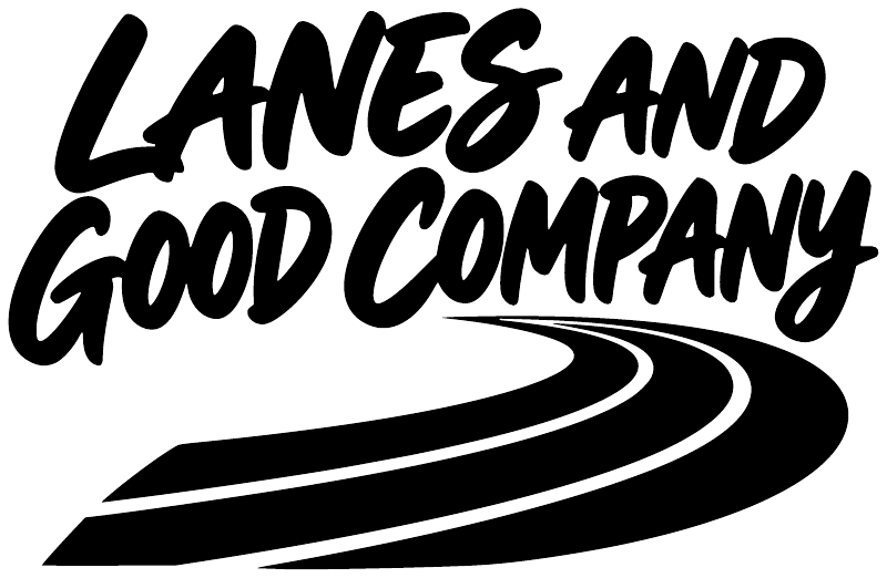 Vinyl decal text 'LANES AND GOOD COMPANY' with track lane line graphic