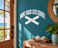 Trackless scroll vinyl decal with white text and crossed track icon
