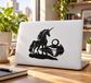 Unicorn vinyl decal: black unicorn, moon, and water scene on a laptop