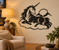 Black unicorn vinyl decal resting on clouds, long horn and flowing mane