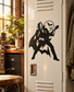 Vinyl decal of a black vampire guitarist with bat wings and moon icon