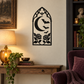Gothic vinyl decal mounted on wall with black arch, moon, bats, and roses