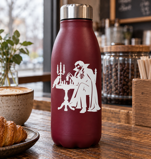 Vampire vinyl decal with white silhouette sitting by a chess table and candles