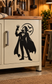 Wine-goblet silhouette vinyl decal with black vampire figure on cabinet door