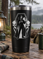 Vinyl decal crest of gothic vampire figure holding cape, on black tumbler
