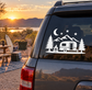 Night sky camper vinyl decal on van window: moon, stars, mountains, trees, camper