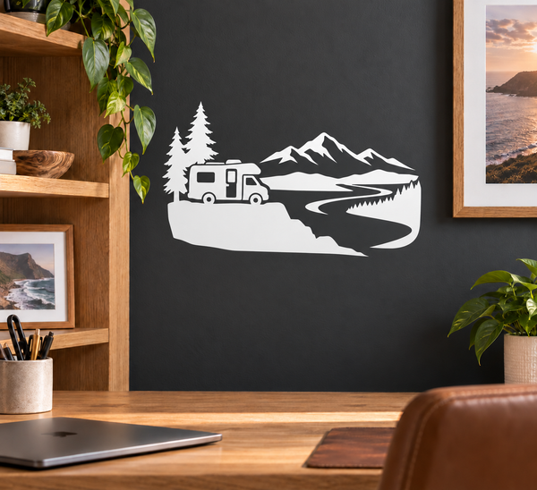 Vinyl decal of camper van with pine trees and mountain landscape on dark wall
