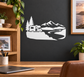 Vinyl decal of camper van with pine trees and mountain landscape on dark wall