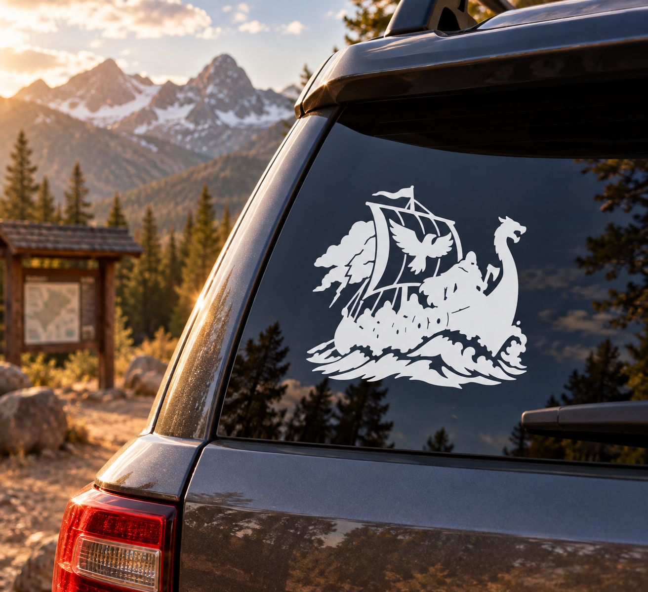 Vinyl decal of a white Viking longship with wings and waves on dark surface