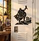 Black vinyl decal of a Viking with raised horn, shield, and skeleton longship