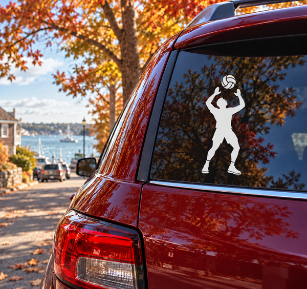 Volleyball player vinyl decal on red car rear window