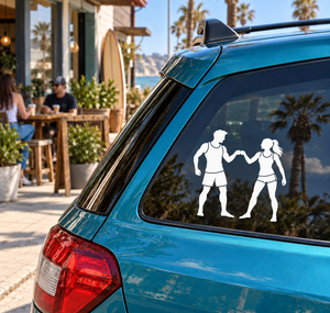 Volleyball vinyl decal of two players fist bumping, white silhouettes on a car window