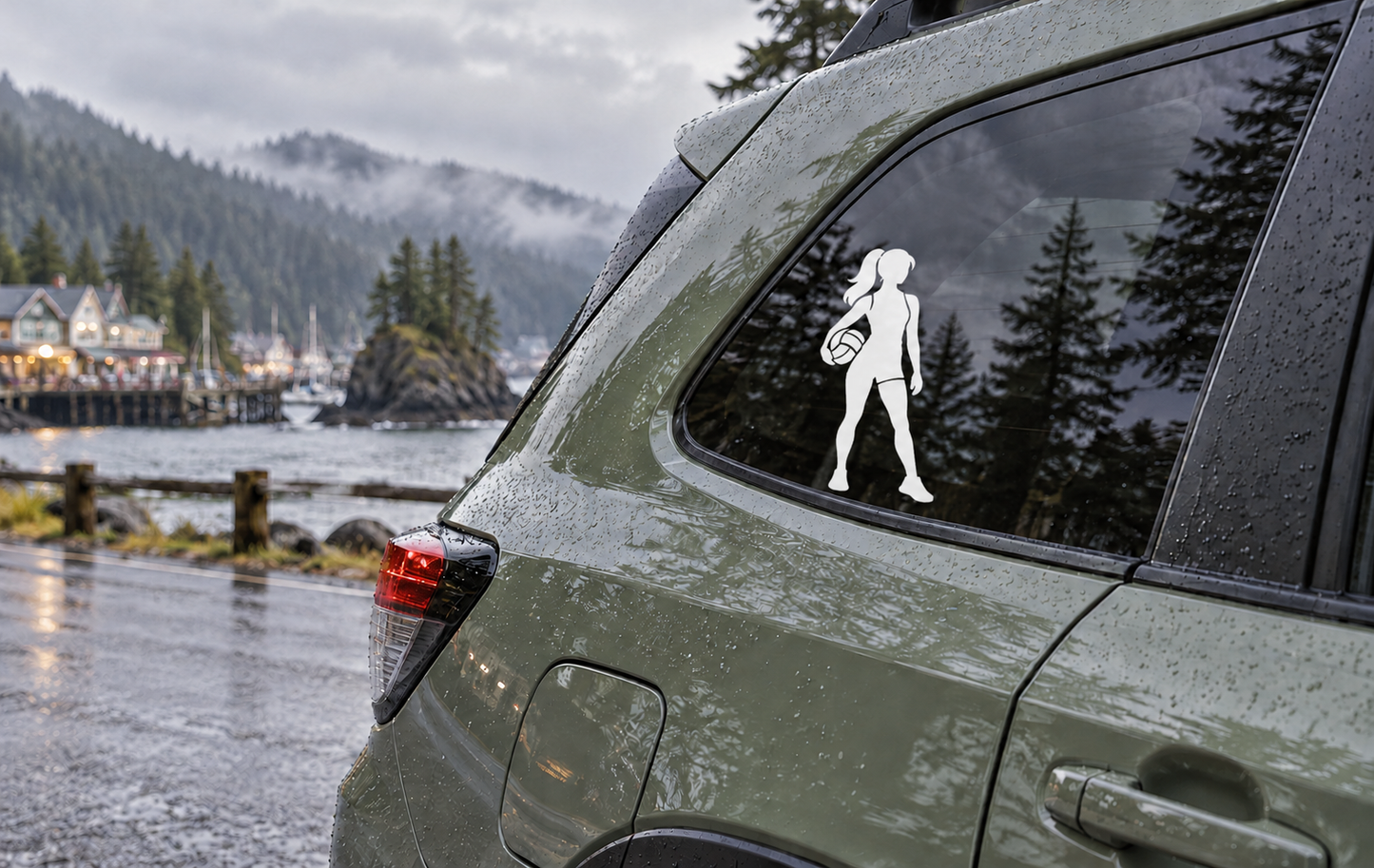 Car window vinyl decal of white volleyball player holding a ball