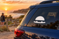 Wakeboarding vinyl decal with sunrise horizon and rider silhouette on a wakeboard