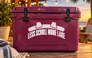 Purple vinyl decal on a cooler: LESS SCROLL MORE LAKE with two hat icons