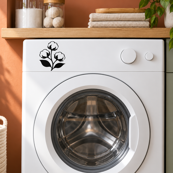 Floral branch vinyl decal on a white washing machine door