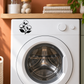 Floral branch vinyl decal on a white washing machine door