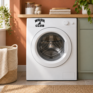 White washing machine with black 'WASH CLUB' vinyl decal above the door