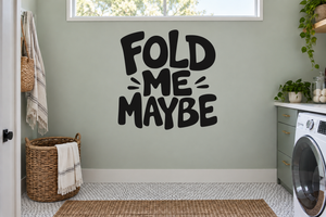 Vinyl wall decal with bold black lettering reading “FOLD ME MAYBE.”