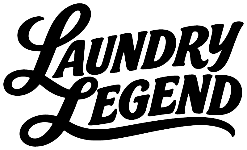 Black "Laundry Legend" vinyl decal with cursive script lettering, close-up