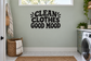 Black "CLEAN CLOTHES GOOD MOOD" vinyl wall decal
