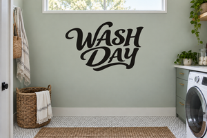 Wash Day vinyl wall decal with black cursive lettering on a light wall