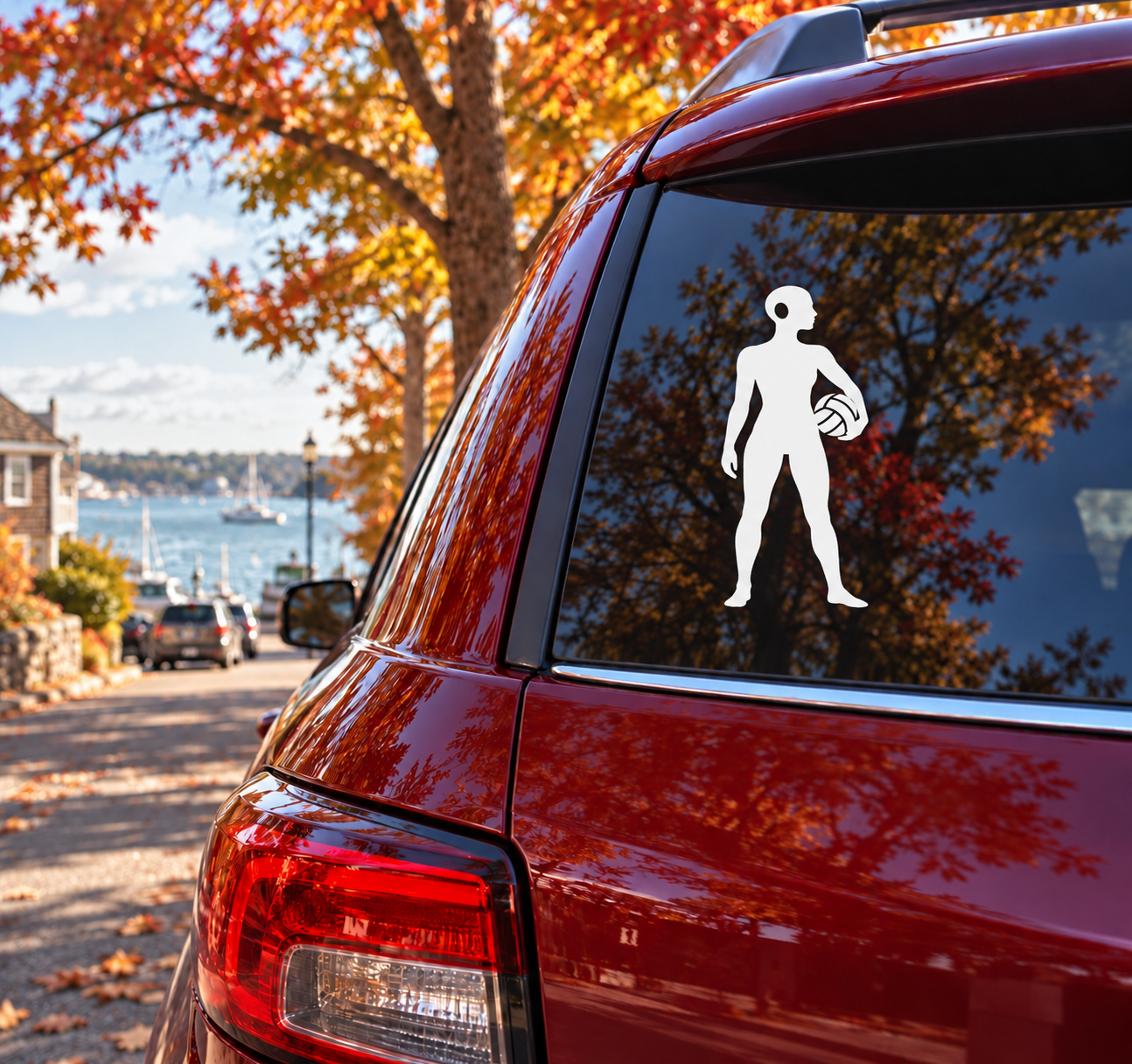 Water polo player vinyl decal on car rear window, white silhouette holding a ball
