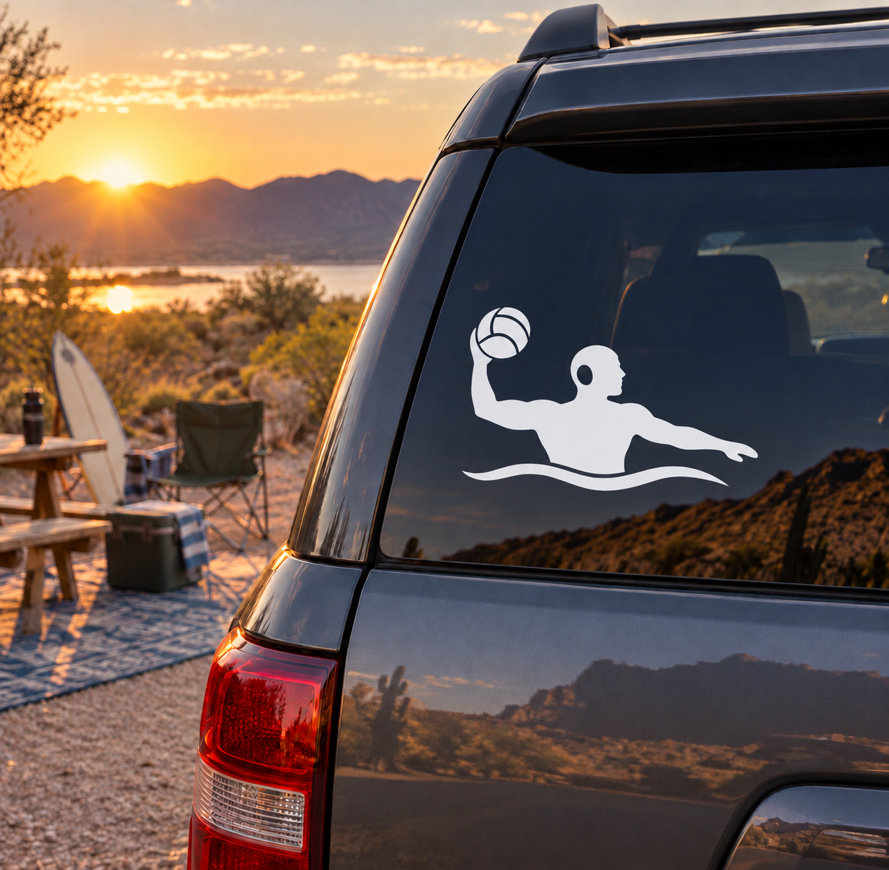 Water polo player vinyl decal on car window, white silhouette holding a ball