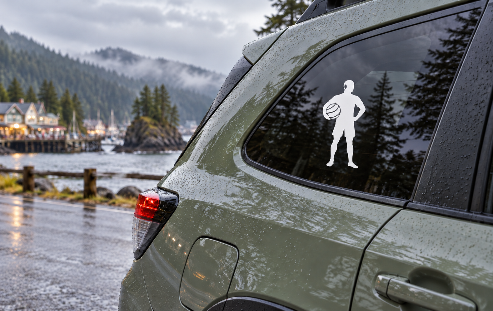 Water polo player vinyl decal silhouette holding a ball on a car window