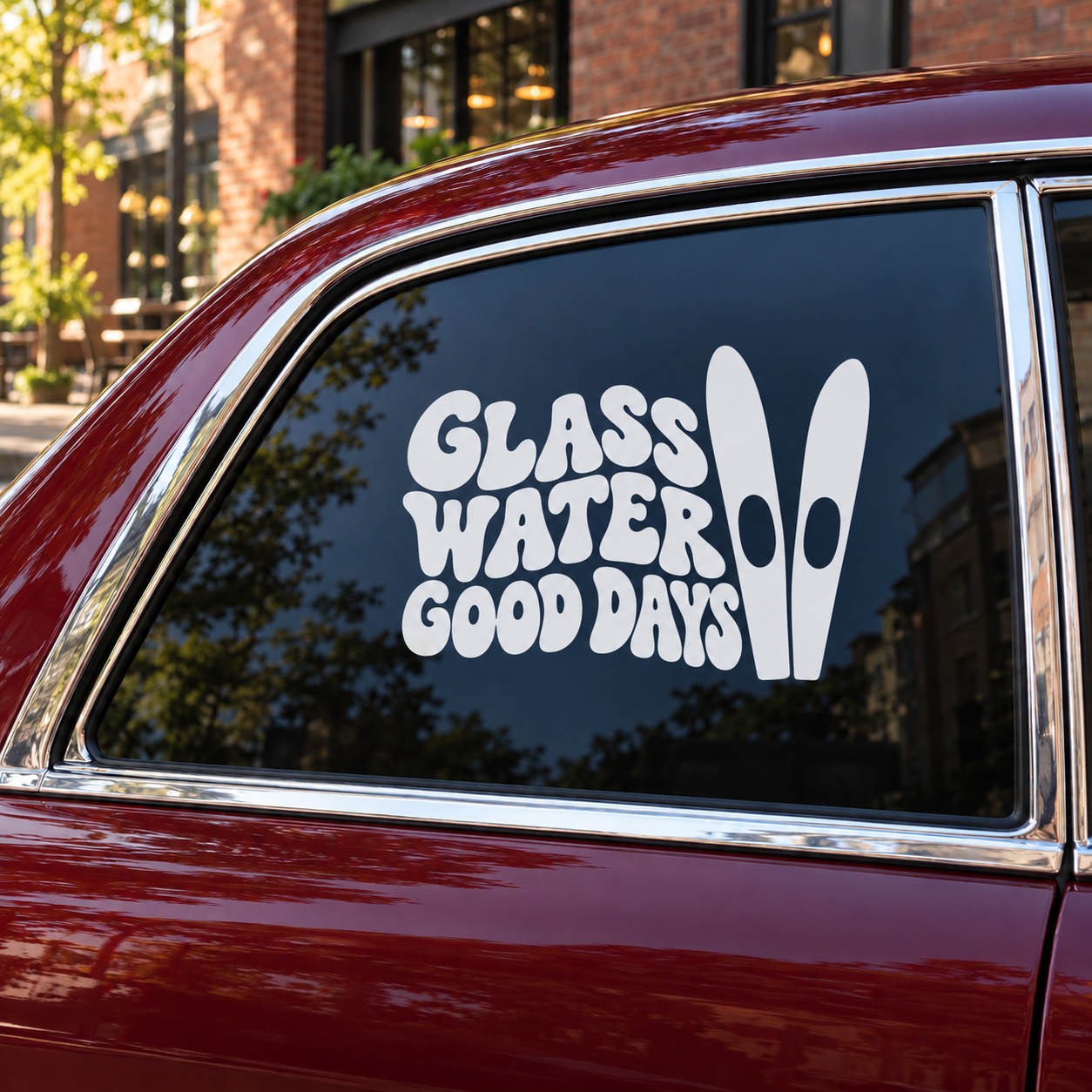 Vinyl decal with “Glass Water Good Days” text and water droplet on window