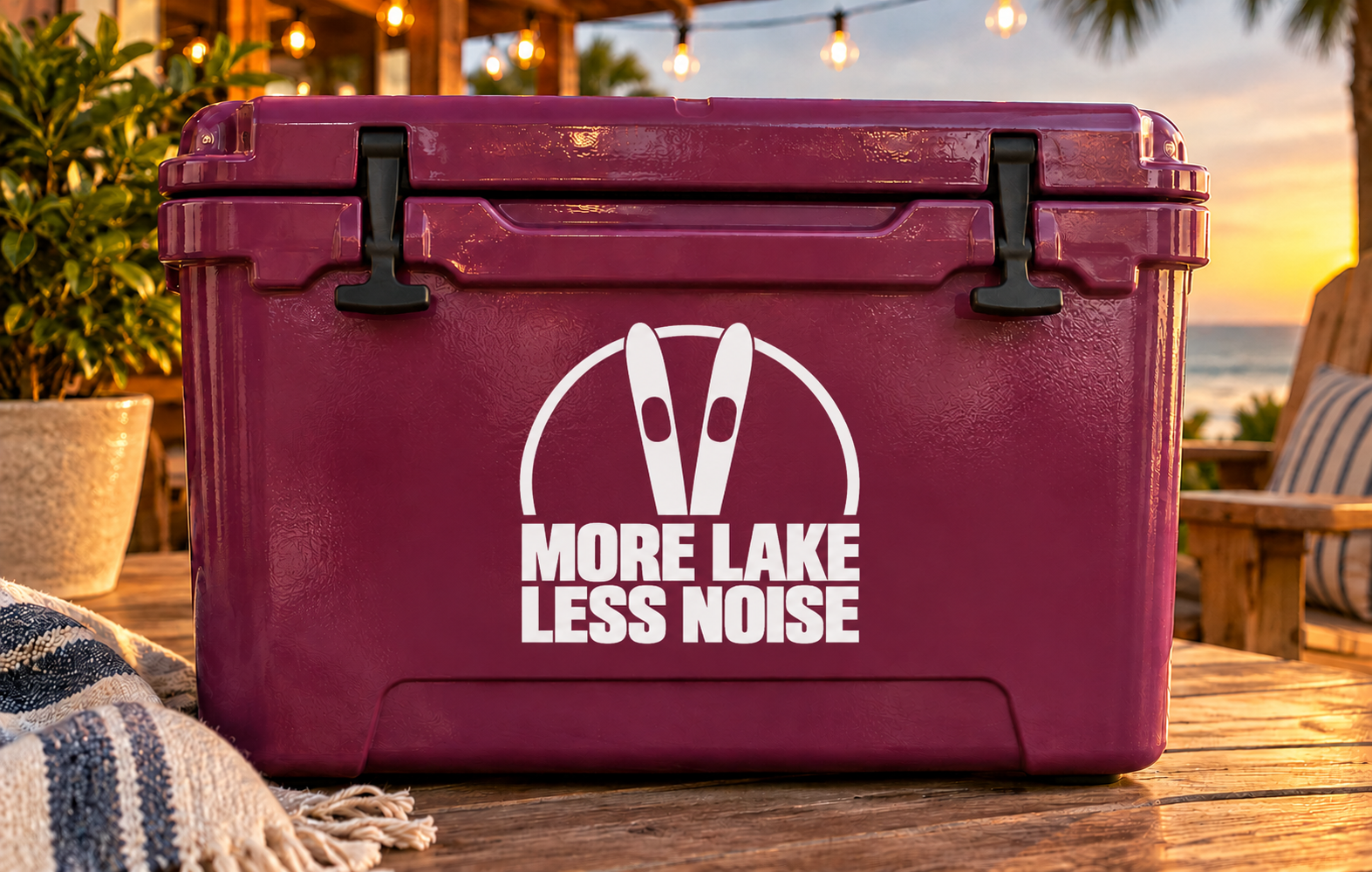Water ski vinyl decal: More Lake Less Noise text with circular ski logo.