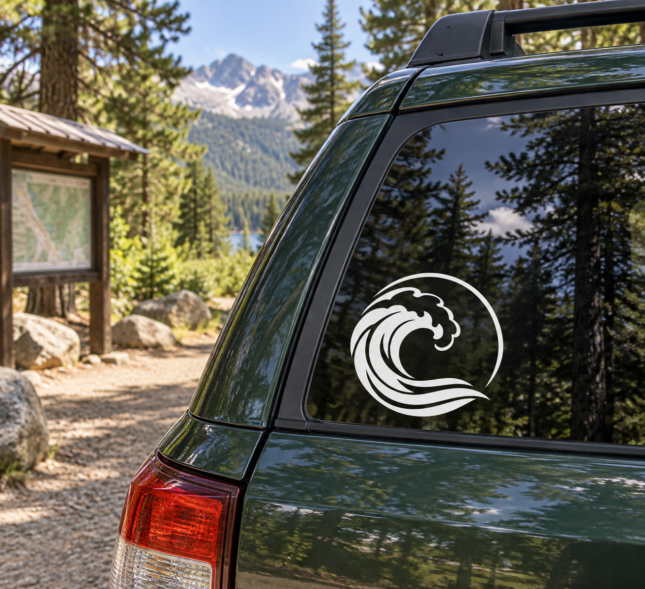 Wave circle vinyl decal with black wave logo on a car side window