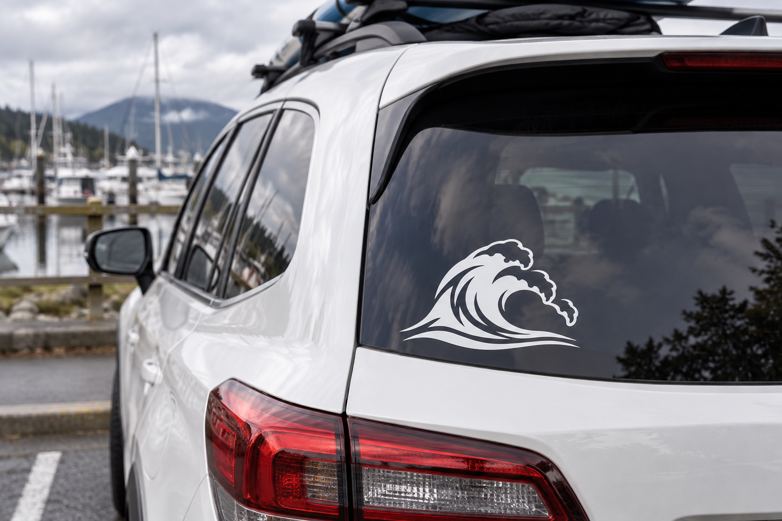 Car rear window vinyl decal: black storm-wave graphic on dark glass
