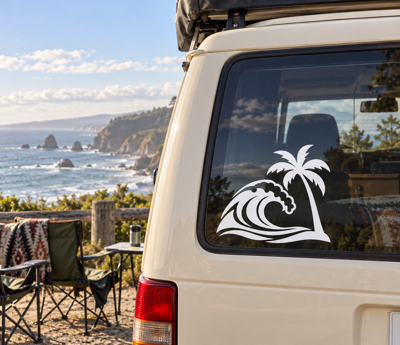 Vinyl decal of black palm tree and wave on a car window