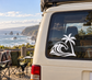 Vinyl decal of black palm tree and wave on a car window