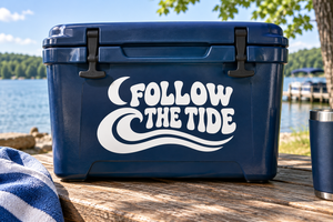 Vinyl decal: white Follow the Tide lettering with wave flourish on dark blue
